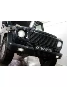 Обшивка фары левая (очки) - 1шт Mercedes-Benz G (W463) 1997-н,в, глянец (под покраску)